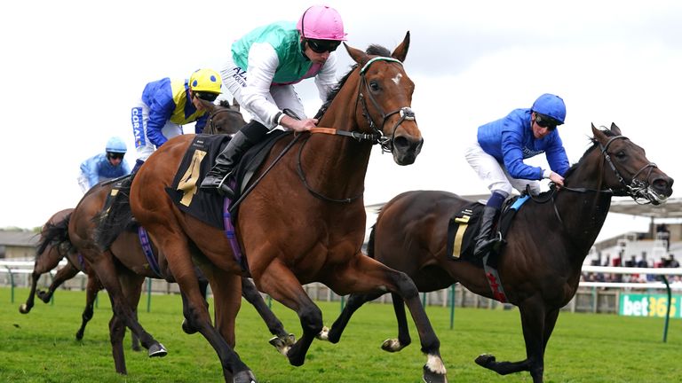 Kikkuli ridden by Ryan Moore (left) on their way to winning the Alex Scott Maiden Stakes on day one of the bet365 Craven Meeting at Newmarket
