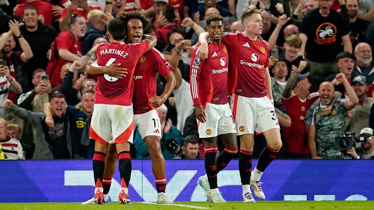 ManUnited's Joshua Zirkzee, second left, celebrates after scoring the winner on his debut at Old Trafford